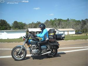 An image of a cyan motorbike
